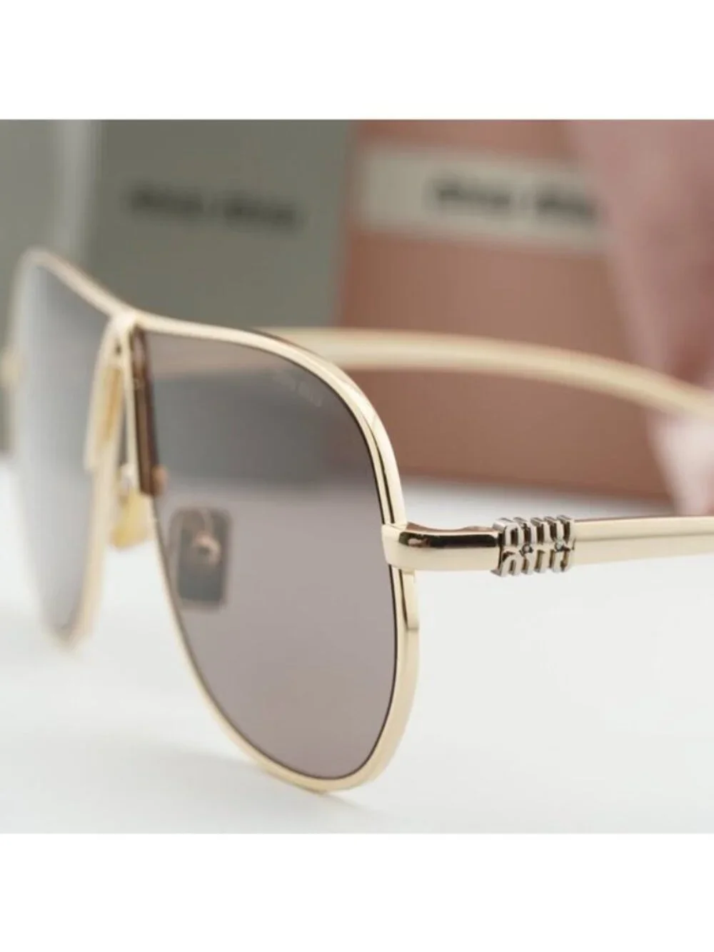 Miu Miu MUA56S 5AK20I Geometric Sunglasses – Gold/Purple Brown